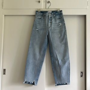 Frame jeans with ripped detailing at seam